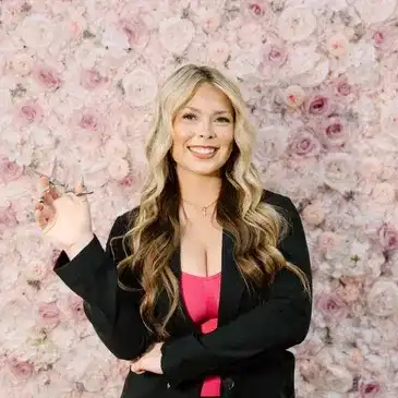 Portrait of Anna, a professional stylist at Salon Bloom - Fort Myers, FL, showcasing their expertise and style.