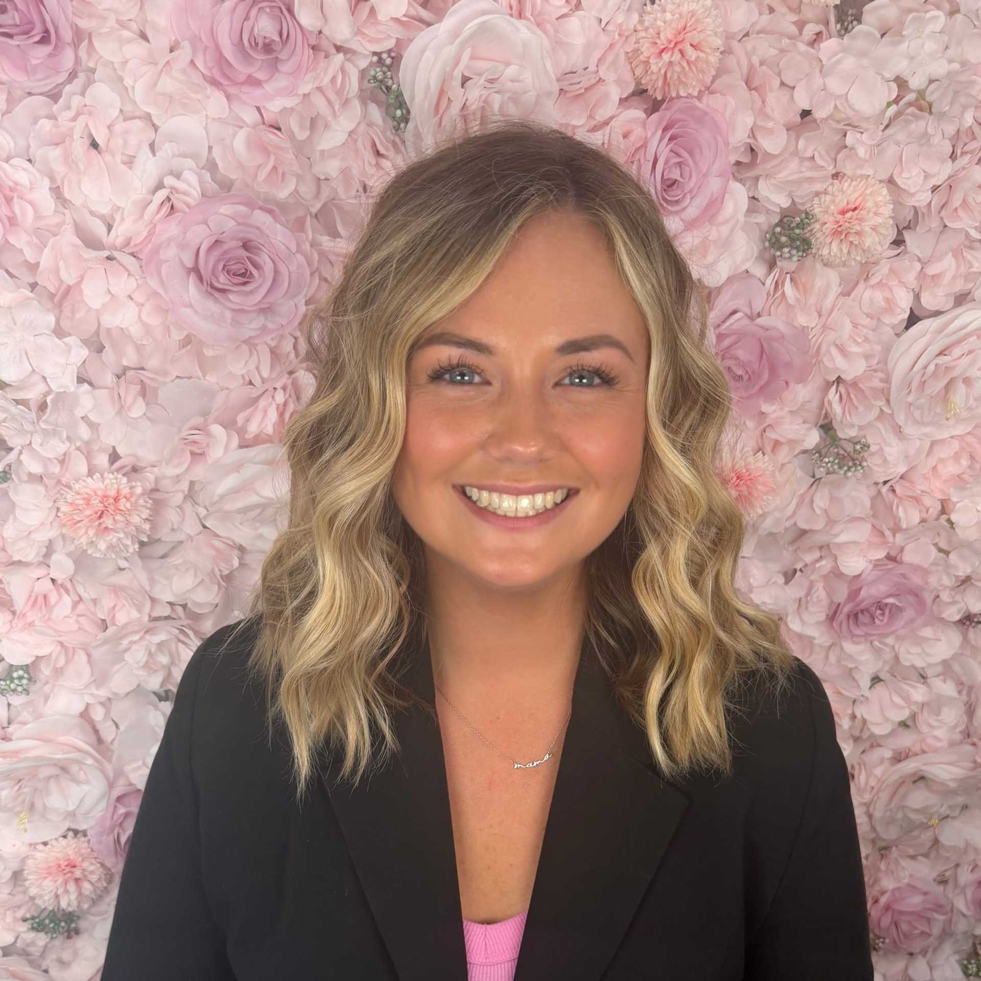 Portrait of Brittany, a professional stylist at Salon Bloom - Fort Myers, FL, showcasing their expertise and style.