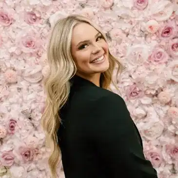Portrait of Savannah, a professional stylist at Salon Bloom - Fort Myers, FL, showcasing their expertise and style.