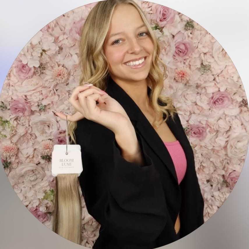 Portrait of Araya, a professional stylist at Salon Bloom - Fort Myers, FL, showcasing their expertise and style.